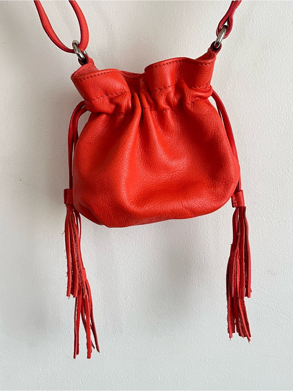 Valentina Orange Leather Drawstring Tassel Crossbody Pouch Purse